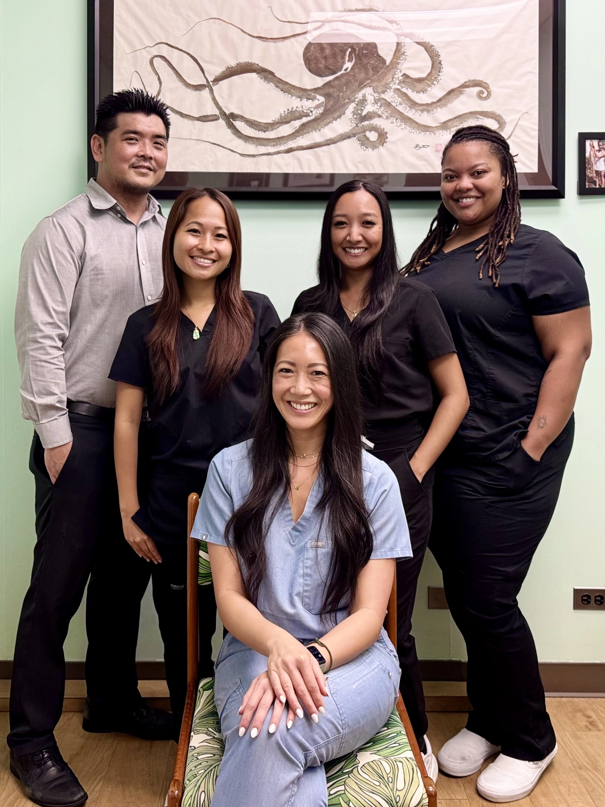 The five-person team at Dr. Keri Wong’s Honolulu dental practice